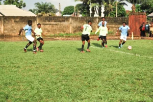 Dreamland Academy striker, Obughikem tracks back to thwart an attack by the Izima strikers led by their captain, Tony